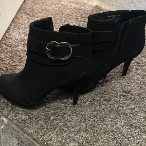 Women’s black high heel booties